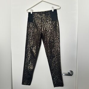 Black skinny pants with metallic gold leopard print pattern size M